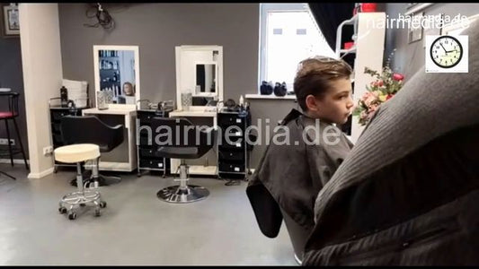 7201 Ukrainian hairdresser in Kaunas 220330 drycut 3 young boy haircut