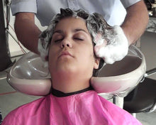 Load image into Gallery viewer, 332 Sabrina teen by barber salon backward hairwash in pink PVC shampoocape