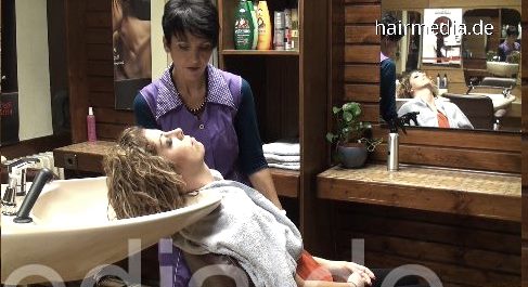 340 barberette EllenH by Lali pampering salon shampooing curly hair by apron barberette