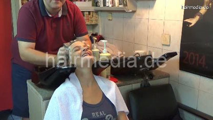 6196 SarahB 1 teen backward salon shampooing by barber in short pants