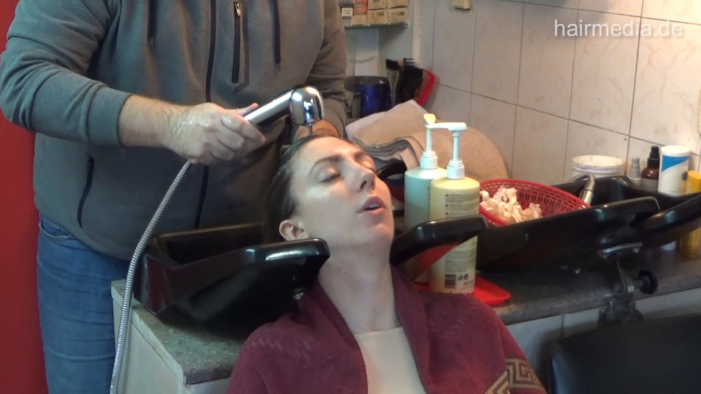 6207 Jana 1 backward salon shampooing hair and ear by barber