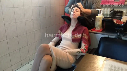 6207 Jana 1 backward salon shampooing hair and ear by barber  CAM 2