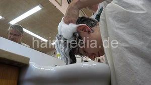 8071 MelanieC 2 forward wash in barbershop by old barber