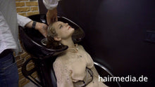 Cargar imagen en el visor de la galería, 8169 Marianna teen shampoo and haircut in black laquer vinyl push button cape