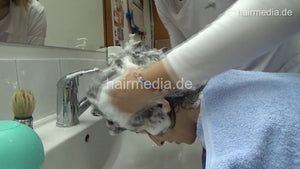 8401 Elena 2 forwardshampoo hair- face- and earwash by female barber in barberchair