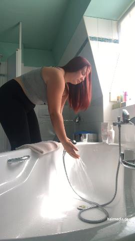 9000 AmeliaS curvy redhead self shampooing forward over tub at home
