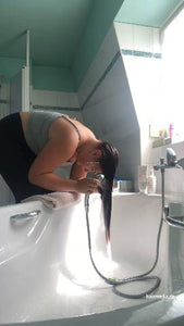 9000 AmeliaS curvy redhead self shampooing forward over tub at home