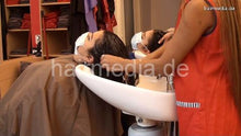 Load image into Gallery viewer, 9091 thick hair facemask teens synced by Zoya in red apron backward salon wash backcam