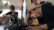 Load image into Gallery viewer, 9092 Zoya 2 XXL hair shampooing forward in leatherpants by Marinela in salon