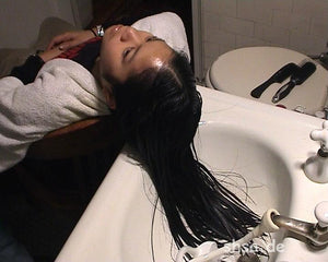 922 Asian Model backward at bathtub home shampooing by barber