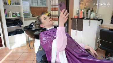 1193 Antonija by barber backward shampooing and blow in purple PVC cape