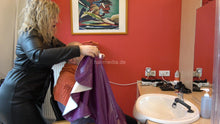 Load image into Gallery viewer, 1152 curvy TineZ in leathercoat vinylcape salon doing male client