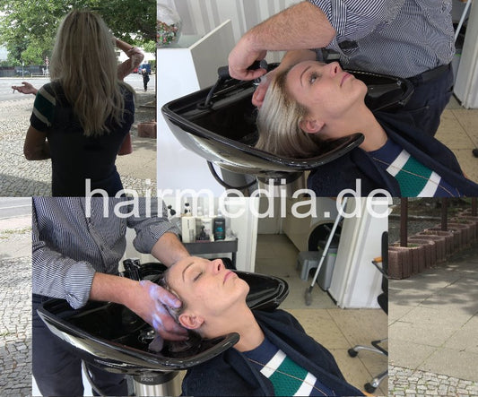 Salon owner shampooed backward by barber blonde long hair