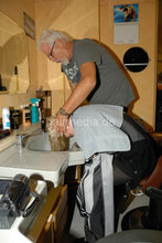 Load image into Gallery viewer, 8063 NadineD s0530 1 forward shampoo hairwash in barber shop by barber men watching