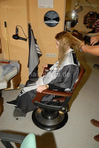 8063 NadineD s0530 1 forward shampoo hairwash in barber shop by barber men watching