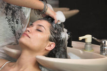 Laden Sie das Bild in den Galerie-Viewer, 198 Tata 3 backward salon shampoo hairwash with help from stylist