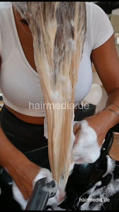 1208 barberette Juliana self shampooing and haircare in salon forward over backward shampoo station - vertical video
