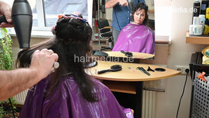 1193 Channel by barber casting backward shampoo, trim and blow in purple cape