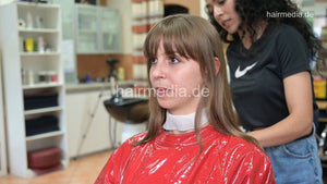 1171 Liesa 1 dry haircut by Amal in red vinyl cape and neckstrip