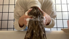 Load image into Gallery viewer, 1076 LuisaBe 1 long blonde hair shampooing at home over bath tub forward