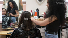 Load image into Gallery viewer, 1171 Meriem 1 smoking session and dry haircut by Amal in black vinyl cape and neckstrip
