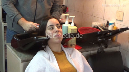 6207 NinaK 1 backward salon shampooing hair and ear by barber