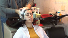 Load image into Gallery viewer, 6207 NinaK 1 backward salon shampooing hair and ear by barber