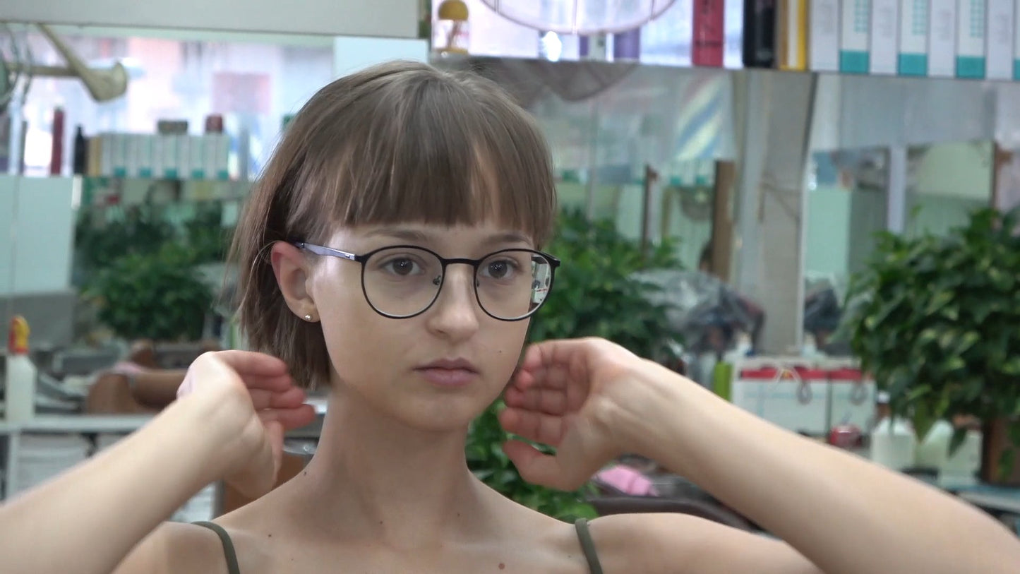 359 RonyaT teen wearing glasses shampooing by barber