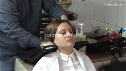 6207 01 Ivana backward salon shampooing hair ear and face by barber