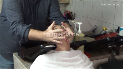 6207 01 Ivana backward salon shampooing hair ear and face by barber