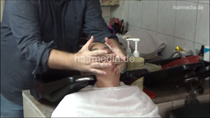 6207 01 Ivana backward salon shampooing hair ear and face by barber