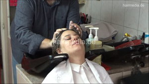 6207 01 Ivana backward salon shampooing hair ear and face by barber