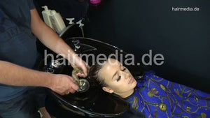 381 Sophie in black salon backward shampooing and haircut by barber