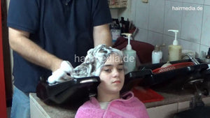 1190 Tea young girl 1 backward shampoo by barber backward