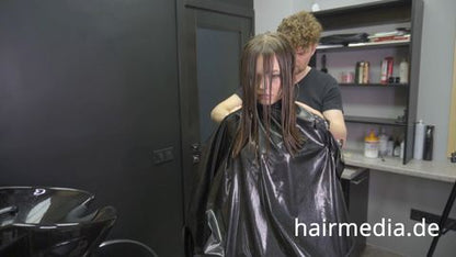 8165 Irina braces 2 haircut by Ukrainian barber in RSK leatherdress and black vinylcape complete