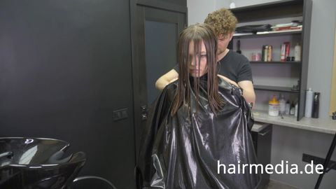 8165 Irina braces 2 haircut by Ukrainian barber in RSK leatherdress and black vinylcape complete
