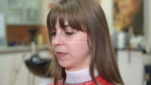 Cargar imagen en el visor de la galería, 1171 Liesa 2 backward salon shampoo by Amal in red vinyl cape and neckstrip