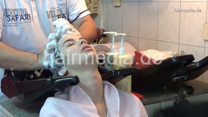 6196 06 Tina hair ear shampooing by barber salon backward shampoostation