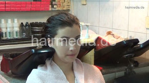 6196 06 Tina hair ear shampooing by barber salon backward shampoostation