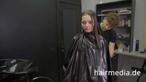8165 Irina braces 2 haircut by Ukrainian barber in RSK leatherdress and black vinylcape complete