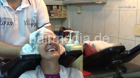 6196 08 Tammy hair and ear shampooing by barber