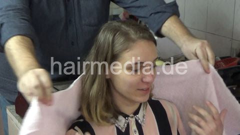 6207 03 Cvetatna backward salon shampooing hair ear and face by barber
