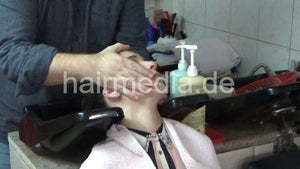 6207 03 Cvetatna backward salon shampooing hair ear and face by barber
