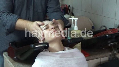 6207 03 Cvetatna backward salon shampooing hair ear and face by barber