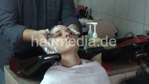 6207 03 Cvetatna backward salon shampooing hair ear and face by barber