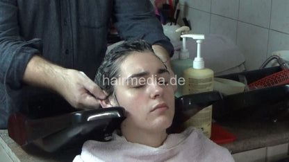 6207 09 VanjaD backward salon shampooing hair ear and face by barber