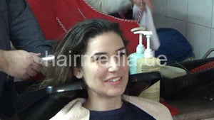 6207 05 NinaK backward salon shampooing hair ear and face by barber