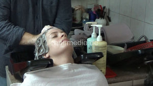 6207 07 Anja backward salon shampooing hair ear and face by barber