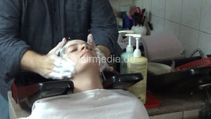 6207 07 Anja backward salon shampooing hair ear and face by barber