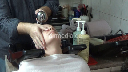 6207 07 Anja backward salon shampooing hair ear and face by barber